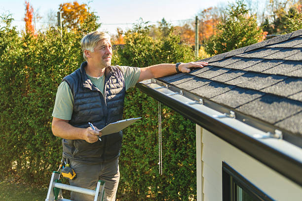 Professional Roofing technician working in McLoud, OK